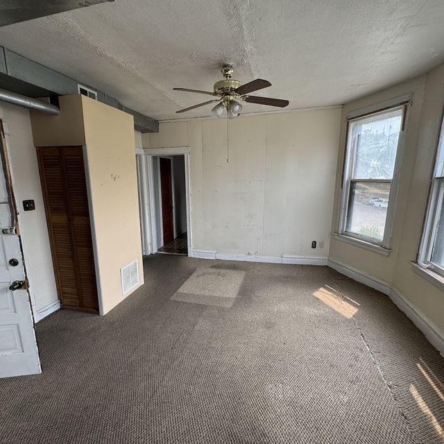 3801 N. Albany Ave.: As bought · living room